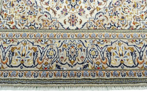 Close-up detail of 2000s Kashan rug from Iran / Persia showing Wool weave