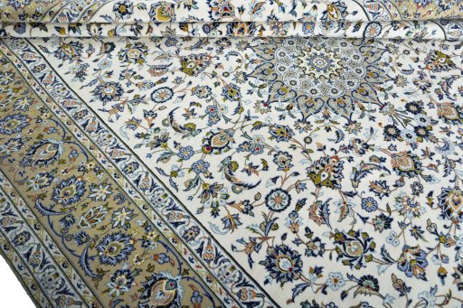 Close-up detail of 2000s Kashan rug from Iran / Persia showing Wool weave