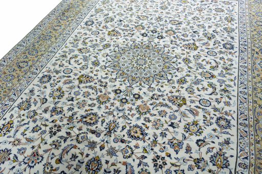 Backside of handmade 2000s Kashan rug showing knot structure and weave density