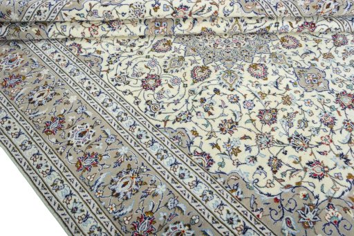 Close-up detail of 2000s Kashan rug from Iran / Persia showing Wool weave