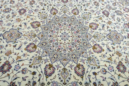 Central medallion detail of 2000s Kashan rug from Iran / Persia