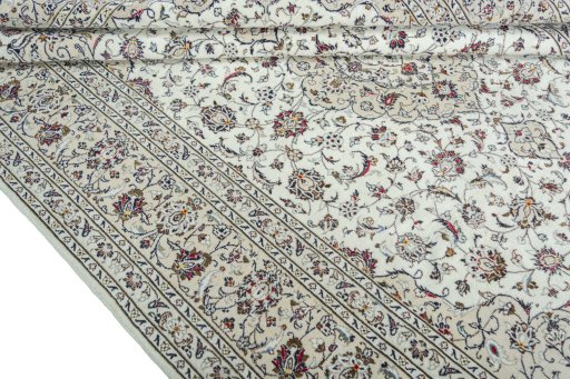 Close-up detail of 2000s Kashan rug from Iran / Persia showing Wool weave