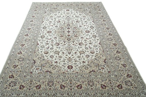 Surface texture of 2000s Kashan rug with natural Wool and intricate pattern
