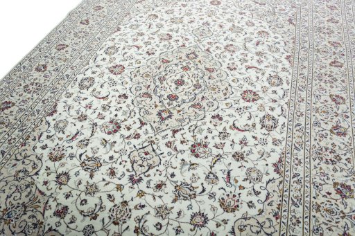 Backside of handmade 2000s Kashan rug showing knot structure and weave density