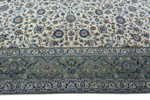 Corner detail of 1970s Kashan rug showing border pattern and Wool pile