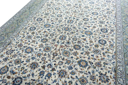 Backside of handmade 1970s Kashan rug showing knot structure and weave density