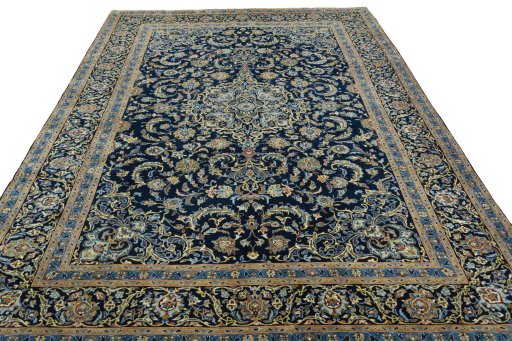 Surface texture of 2000s Kashan rug with natural Wool and intricate pattern