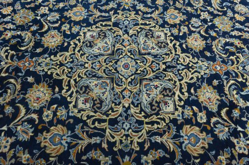 Central medallion detail of 2000s Kashan rug from Iran / Persia
