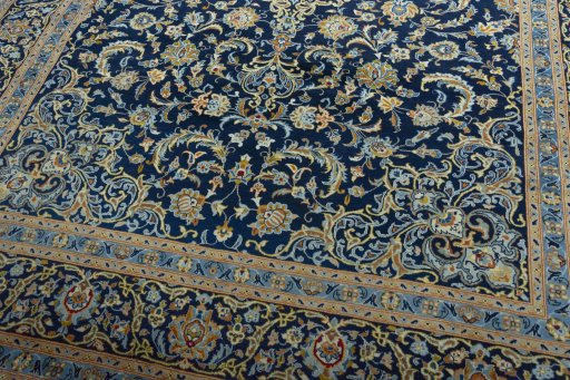 Close-up detail of 2000s Kashan rug from Iran / Persia showing Wool weave