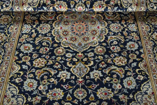 Close-up detail of 1970s Kashan rug from Iran / Persia showing Wool weave