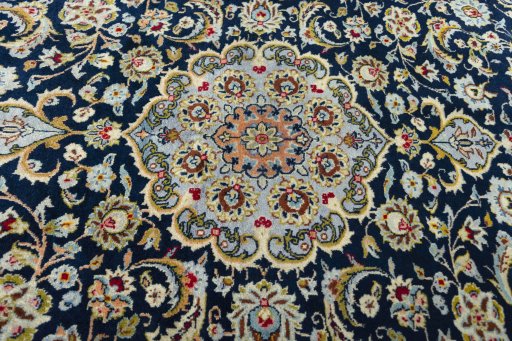 Central medallion detail of 1970s Kashan rug from Iran / Persia