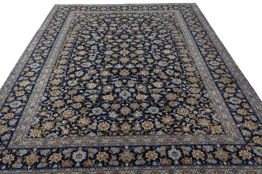 Surface texture of 2000s Kashan rug with natural Wool and intricate pattern