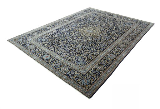 Corner detail of 2000s Kashan rug showing border pattern and Wool pile