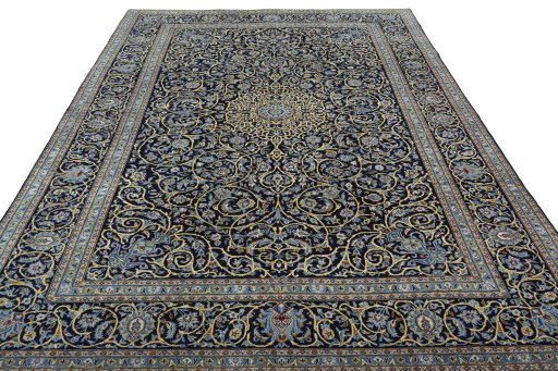 Surface texture of 2000s Kashan rug with natural Wool and intricate pattern