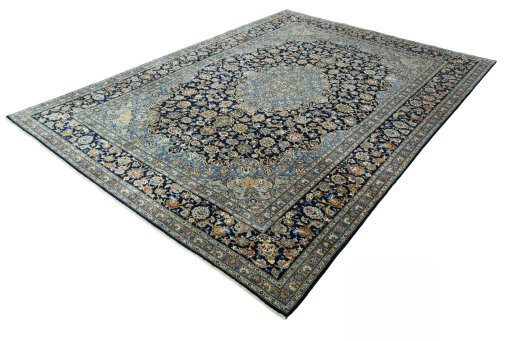 Corner detail of 2000s Kashan rug showing border pattern and Wool pile