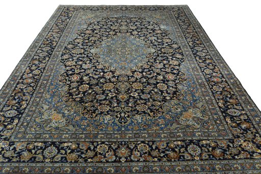 Surface texture of 2000s Kashan rug with natural Wool and intricate pattern