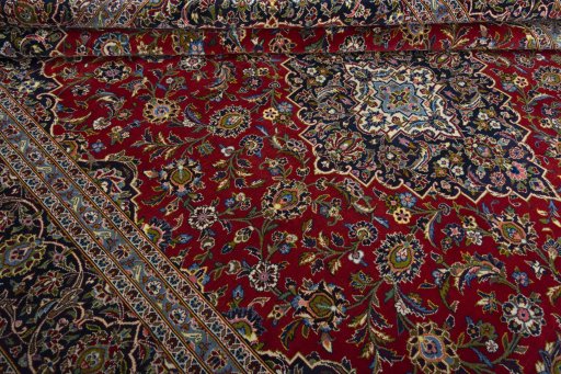 Close-up detail of 2000s Kashan rug from Iran / Persia showing Wool weave