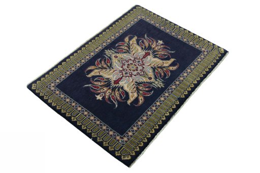 Close-up detail of 2000s Kashan rug from Iran / Persia showing Wool weave