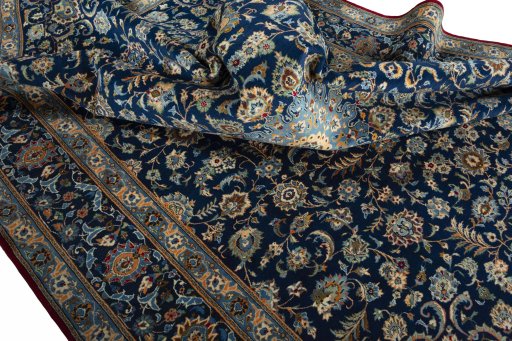 Surface texture of 2000s Kashan rug with natural Wool and intricate pattern