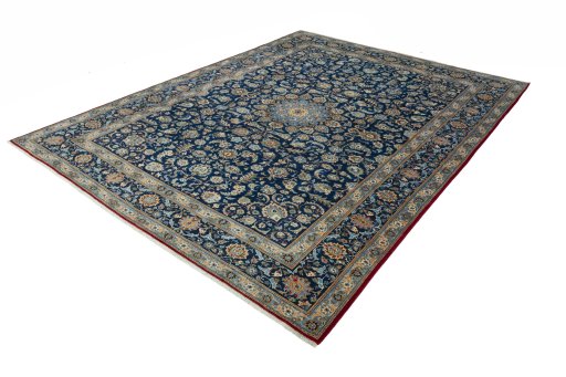 Corner detail of 2000s Kashan rug showing border pattern and Wool pile