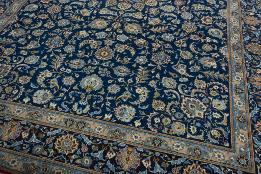Close-up detail of 2000s Kashan rug from Iran / Persia showing Wool weave