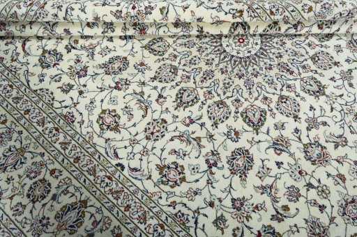 Close-up detail of 2000s Kashan rug from Iran / Persia showing Wool weave
