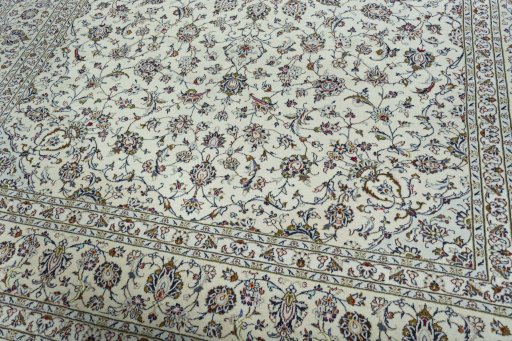 Close-up detail of 2000s Kashan rug from Iran / Persia showing Wool weave