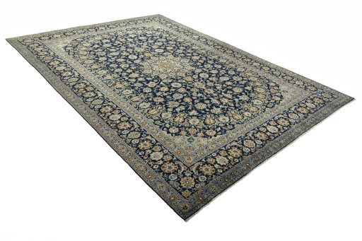 Close-up detail of 2000s Kashan rug from Iran / Persia showing Wool weave