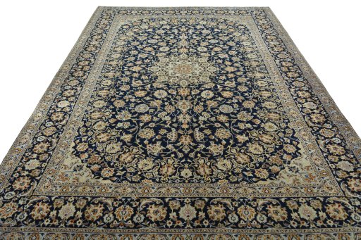 Surface texture of 2000s Kashan rug with natural Wool and intricate pattern