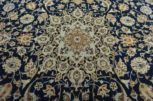 Central medallion detail of 2000s Kashan rug from Iran / Persia