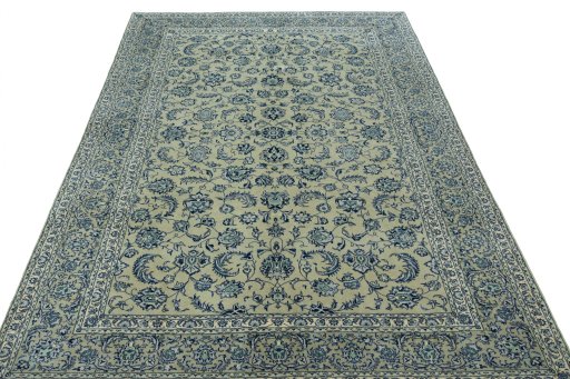 Surface texture of 2000s Kashan rug with natural Wool and intricate pattern