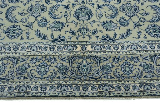Full view of 2000s Kashan rug from Iran / Persia, 328 × 223 cm in Green tones
