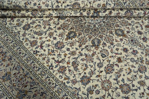 Close-up detail of 2000s Kashan rug from Iran / Persia showing Wool weave