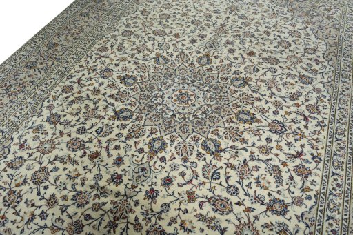 Backside of handmade 2000s Kashan rug showing knot structure and weave density