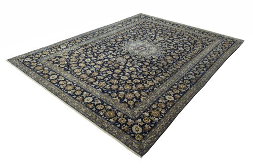 Corner detail of 2000s Kashan rug showing border pattern and Wool pile