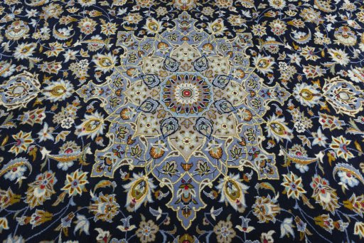 Central medallion detail of 2000s Kashan rug from Iran / Persia