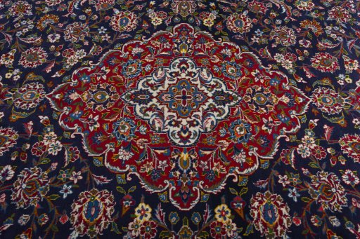 Central medallion detail of 2000s Kashan rug from Iran / Persia