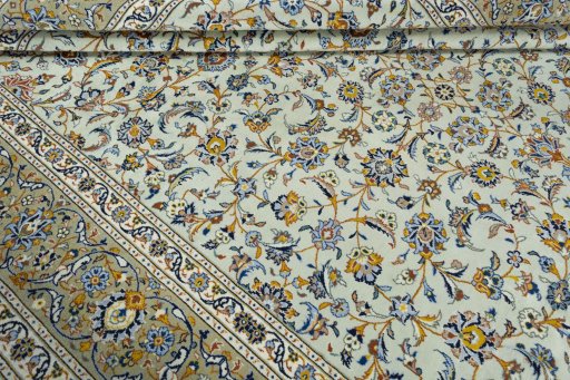 Close-up detail of 2000s Kashan rug from Iran / Persia showing Wool weave