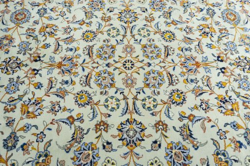 Central medallion detail of 2000s Kashan rug from Iran / Persia