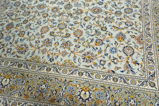 Close-up detail of 2000s Kashan rug from Iran / Persia showing Wool weave