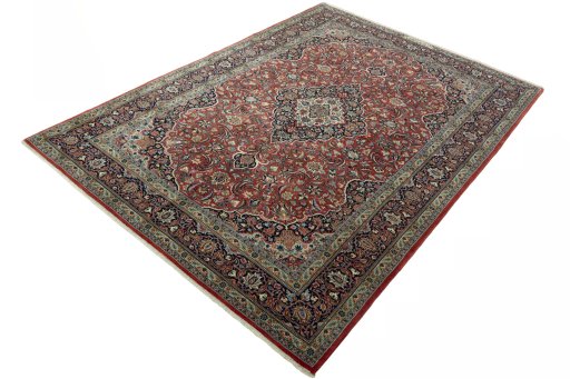Corner detail of New Kashan rug showing border pattern and Cork pile