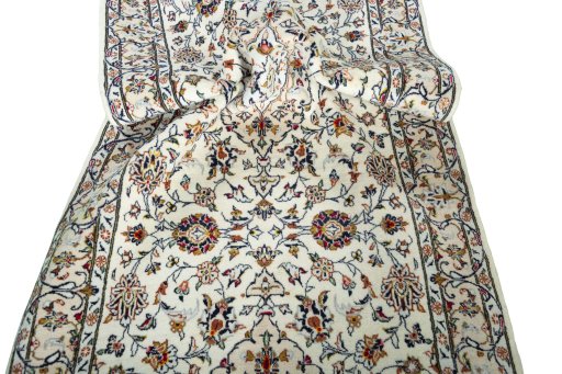 Close-up detail of New Kashan rug from Iran / Persia showing Wool weave