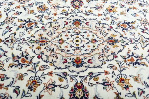 Central medallion detail of New Kashan rug from Iran / Persia