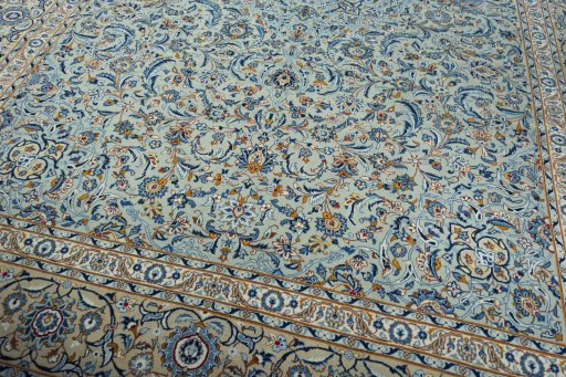 Close-up detail of 2000s Kashan rug from Iran / Persia showing Wool weave