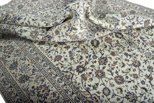 Surface texture of 2000s Kashan rug with natural Wool and intricate pattern