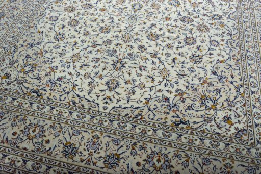 Close-up detail of 2000s Kashan rug from Iran / Persia showing Wool weave