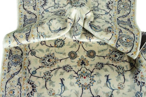 Close-up detail of 2000s Kashan rug from Iran / Persia showing Wool weave