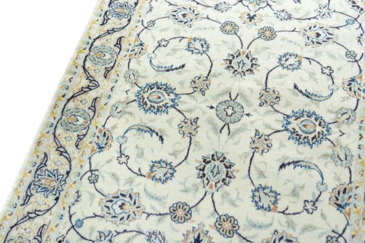 Backside of handmade 2000s Kashan rug showing knot structure and weave density