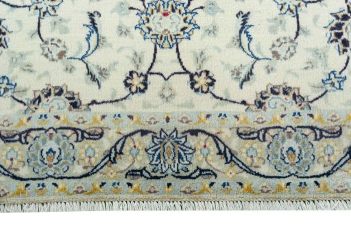 Close-up detail of 2000s Kashan rug from Iran / Persia showing Wool weave