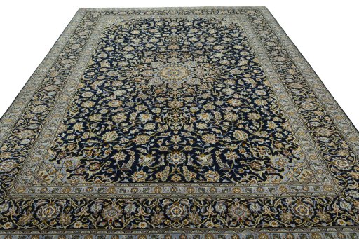 Surface texture of 2000s Kashan rug with natural Wool and intricate pattern